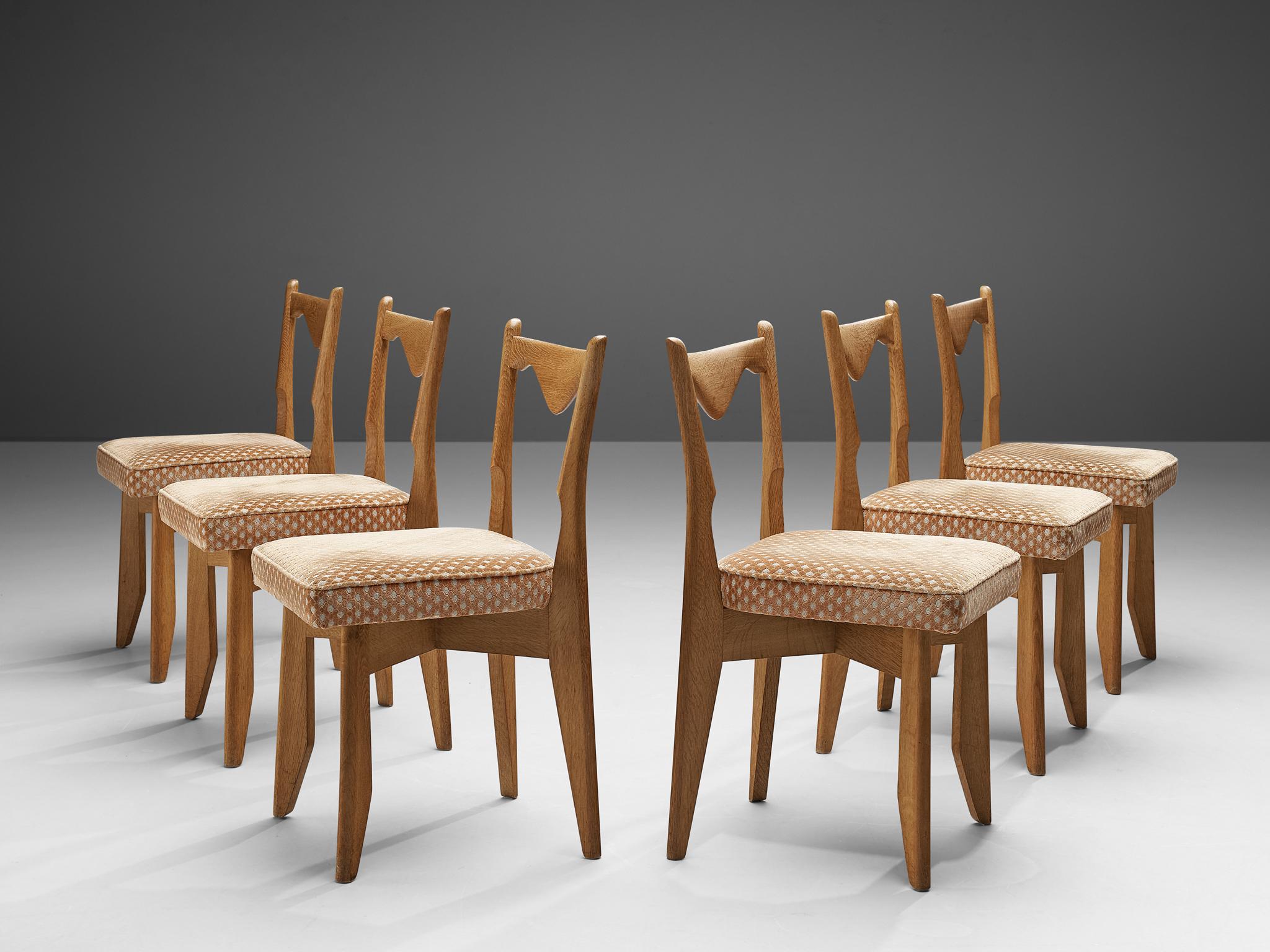 Guillerme et Chambron, set of six dining chairs, oak, France, 1960s

Set of six dining chairs in solid oak by Guillerme and Chambron. These chairs show the characteristic frame of this French designer duo. They feature sturdy and tapered legs and a