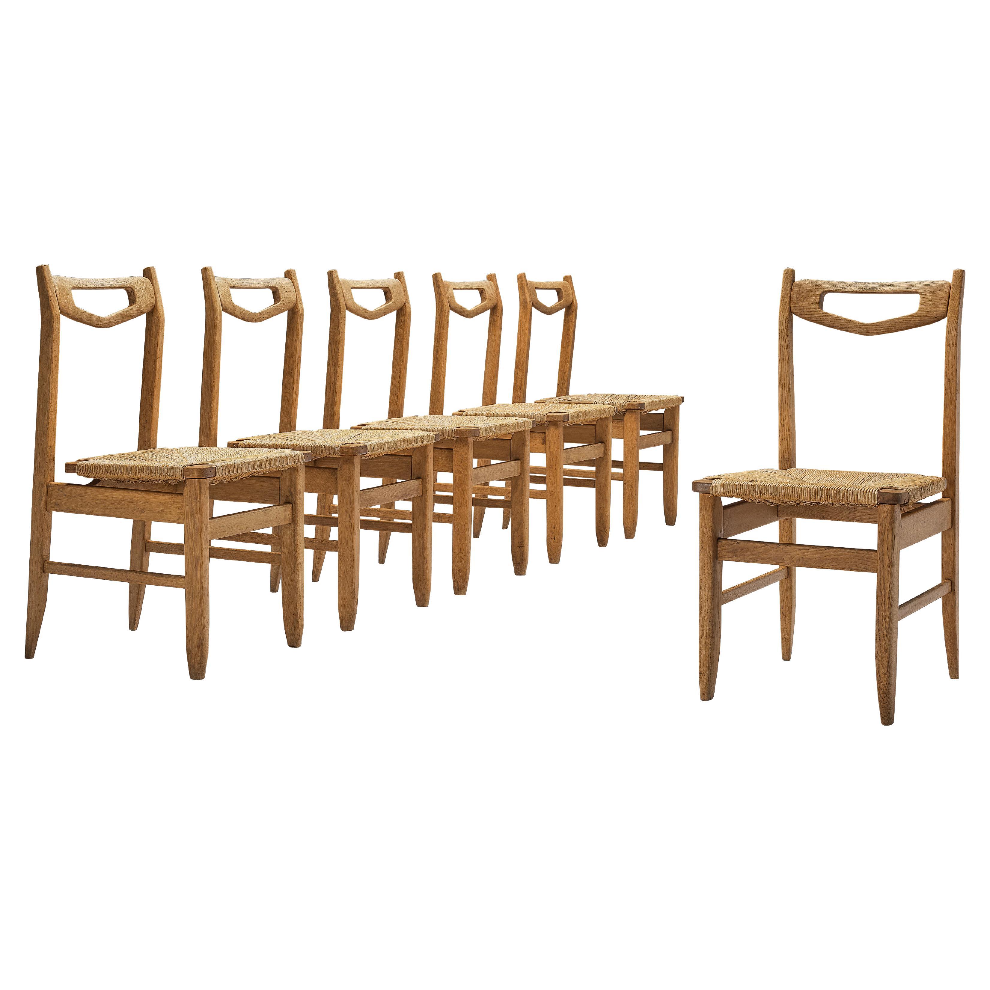Guillerme et Chambron Set of Six Dining Chairs in Oak with Rush Seats