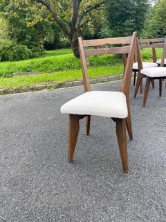 Guillerme et Chambron, conjunto de diez sillas de roble. Edición Votre Maison, hacia 1970.