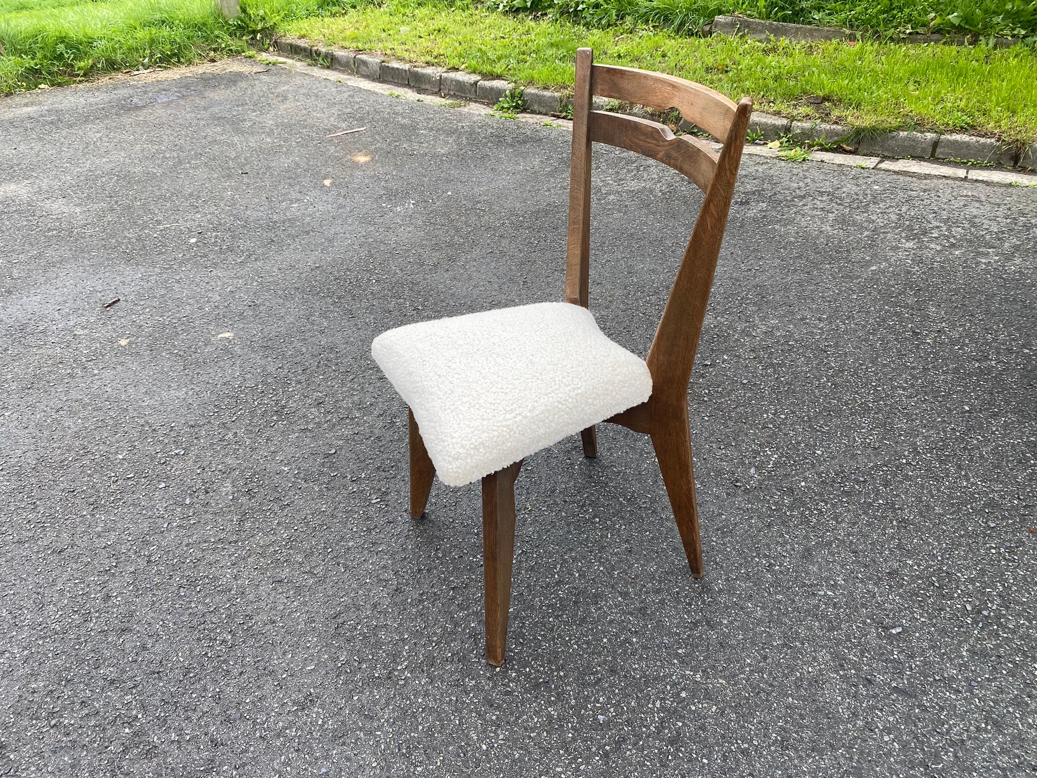 20th Century Guillerme et Chambron, set of ten oak chairs. Edition Votre Maison, circa 1970. For Sale