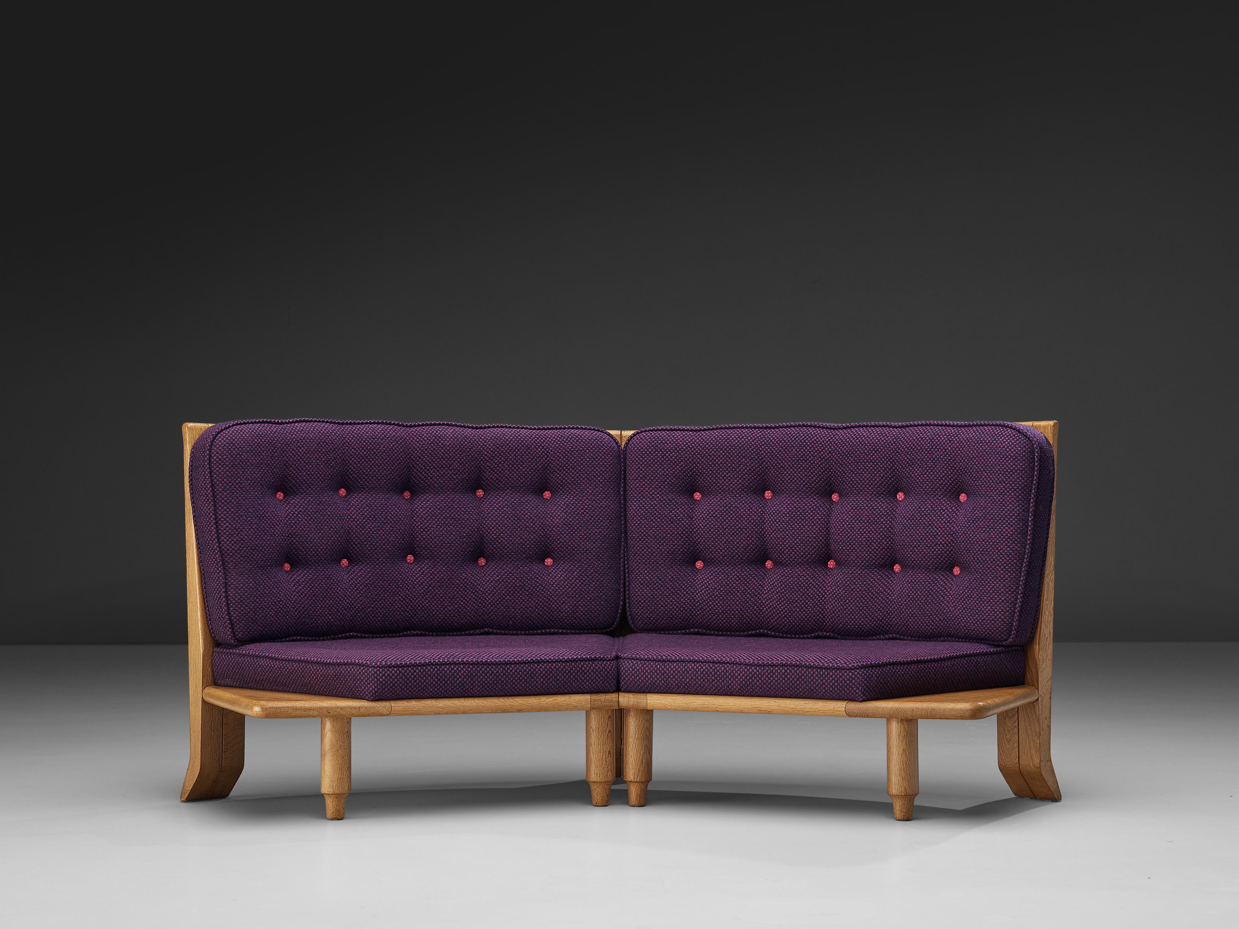 Guillerme & Chambron, sofa in purple fabric and oak, 1960s, France.

This distinctive sofa in beautifully patinated oak are by the French designer duo Guillerme et Chambron. This high back settee in solid oak shares the typical decorative details