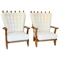 Guillerme et Chambron Votre Maison Pair of French Oak Grand Repos Lounge Chairs