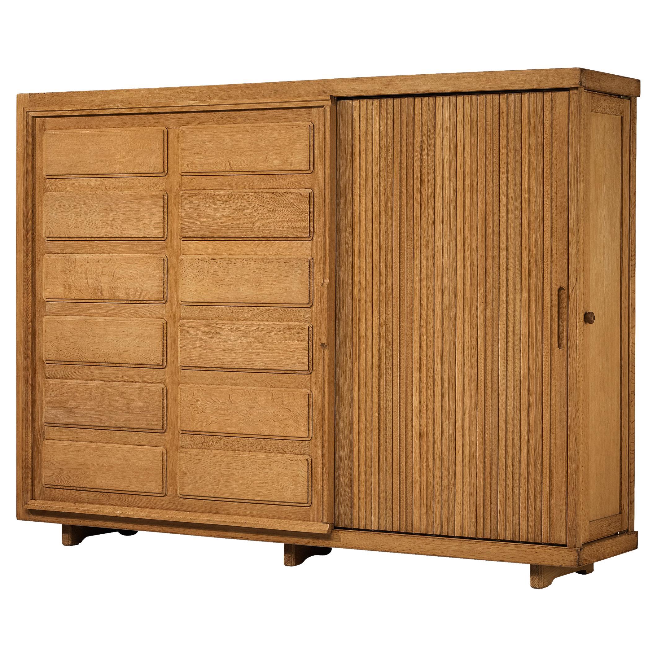 Guillerme et Chambron Wardrobe in Oak with Carved Doors