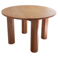Guilloche Dining Table, By Josh Page Studio. Round oak top with octagonal legs.