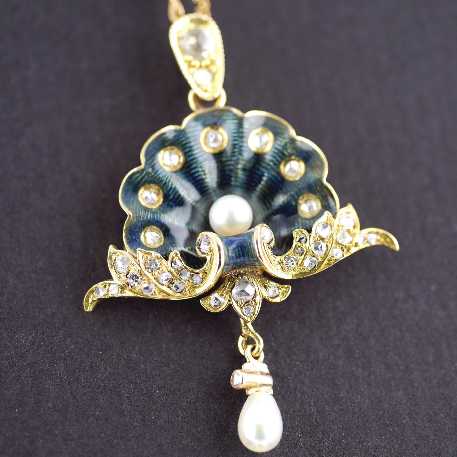 Belle Epoque Pendant in 18 carat gold circa 1900

18 carat gold Oyster shell in Guilloché enamel and diamond set, with natural salt water pearls.

Guilloché is a technique where metal is decorated with a pattern of engravings, mechanically by engine