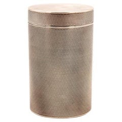 Guilloche silver box in cylindrical shape