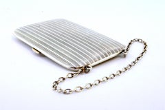 Guilloche silver card holder with gold interior and two business card holders