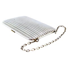 Guilloche silver card holder with gold interior and two business card holders