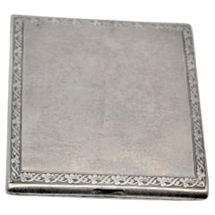 Guilloche silver cardboard box with a square shape