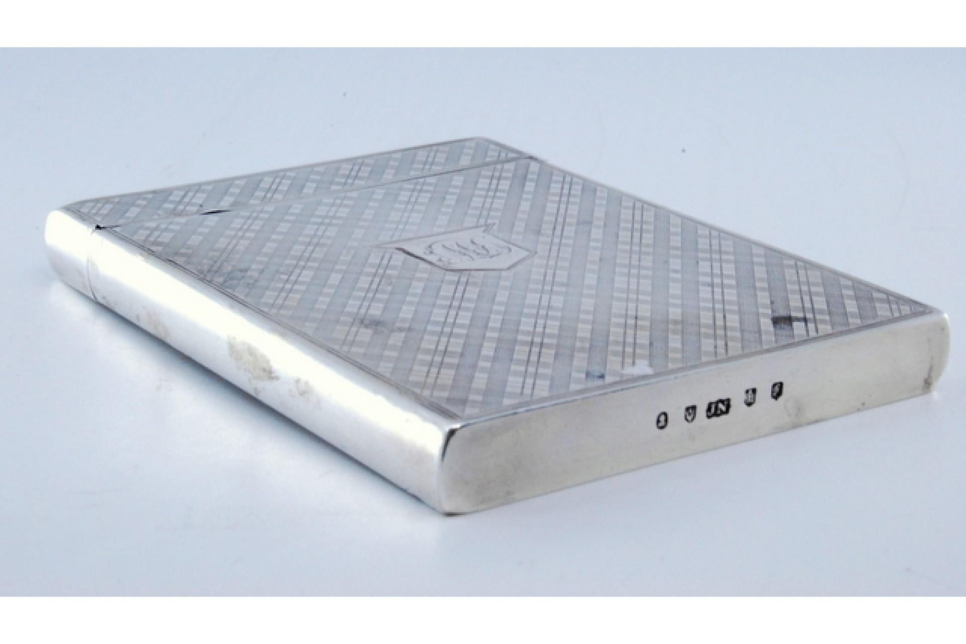 Description: Guilloche silver card case with central monogram card and hinged lid. Metal: Silver. Origin: French. Brand: Cisne. Weight: 89.18 grams. Dimensions: 9.5x7cm. Content: 925/1000. Assay Mark: Yes, unknown maker's mark. Additional