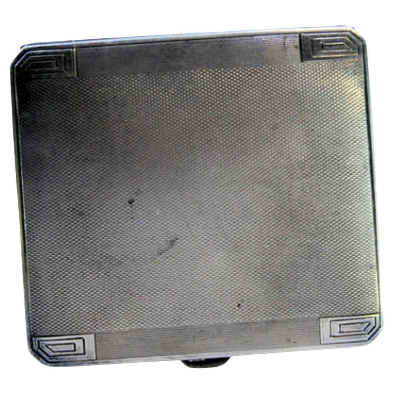 Guilloche silver case with engravings, beveled corners and hinged lid