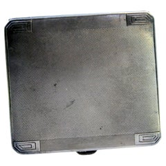 Guilloche silver case with engravings, beveled corners and hinged lid