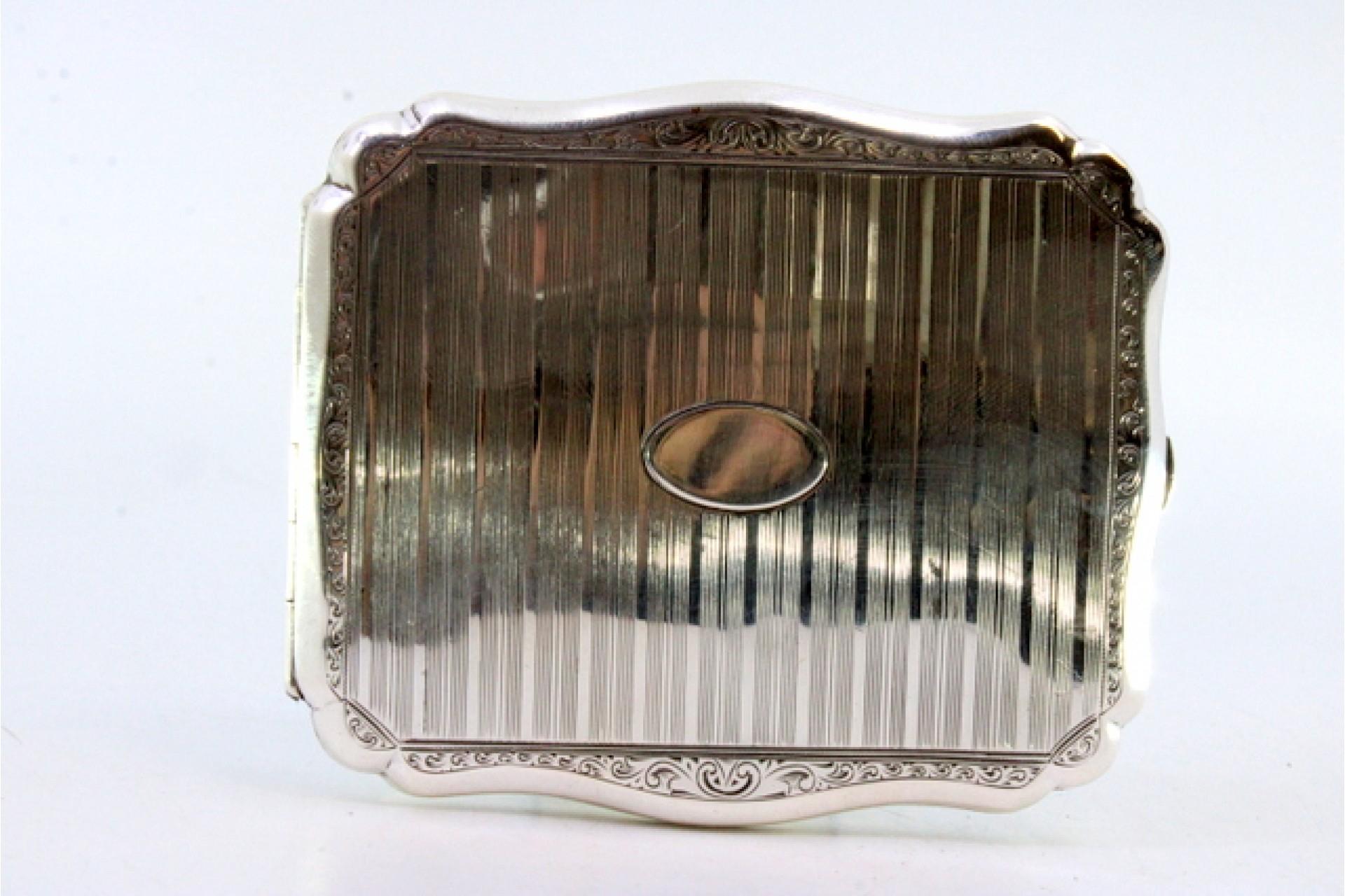 European Guilloche silver case with floral bands around monogram For Sale