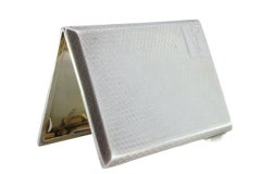 Guilloche silver case with spring closure, monogram plate and hinged lid