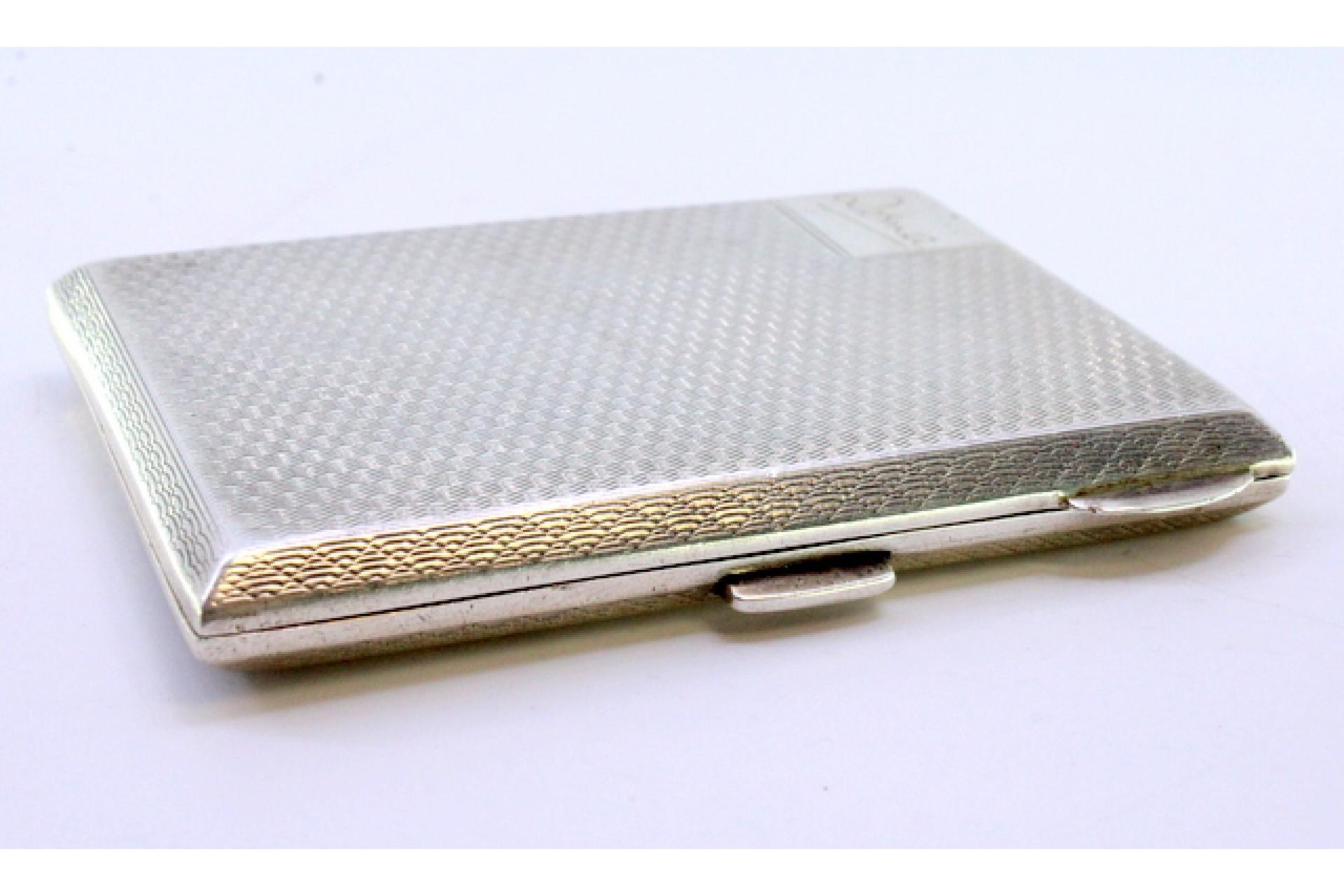 Silver Guilloche silver case with spring closure, monogram plate and hinged lid For Sale