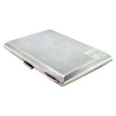 Guilloche silver case with spring closure, monogram plate and hinged lid