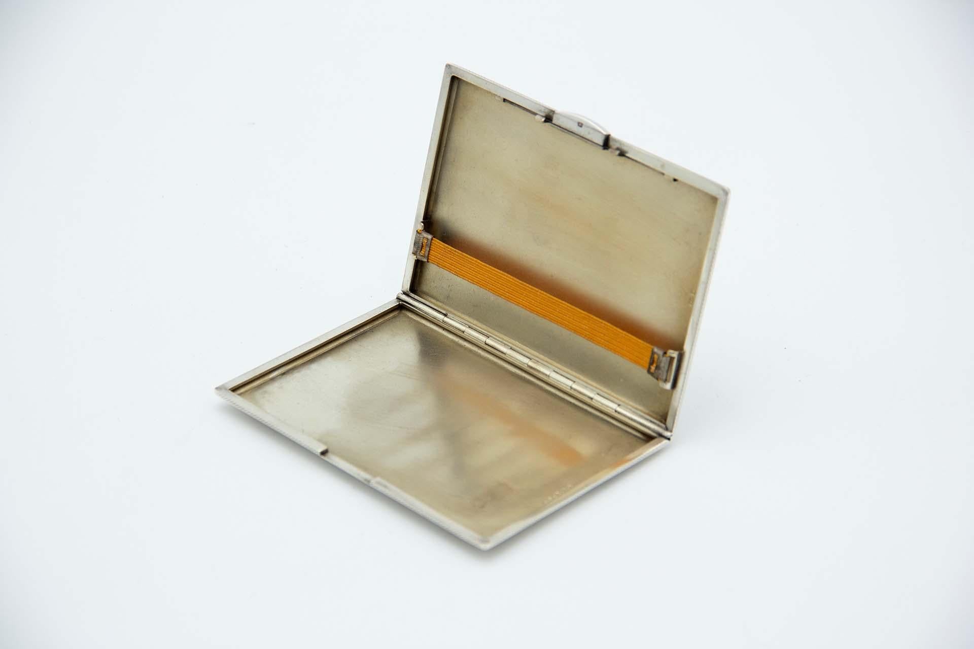 Description: Guilloche silver cigarette case, surrounding strips and gold interior. Metal: Silver. Origin: English. Brand: London. Weight: 194.32 grams. Dimensions: 12.5cmx1cm. Content: 925/1000. Assay Mark: Yes, 1946. Additional information: Good