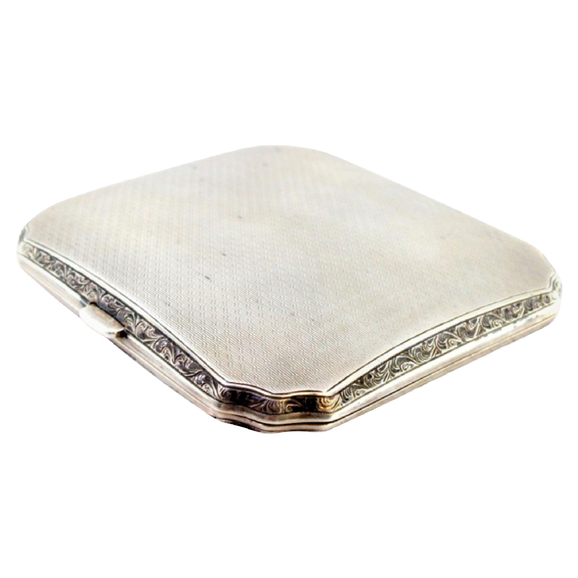 Guilloche silver cigarette case w/ beveled corners, gold interior
hinged lid