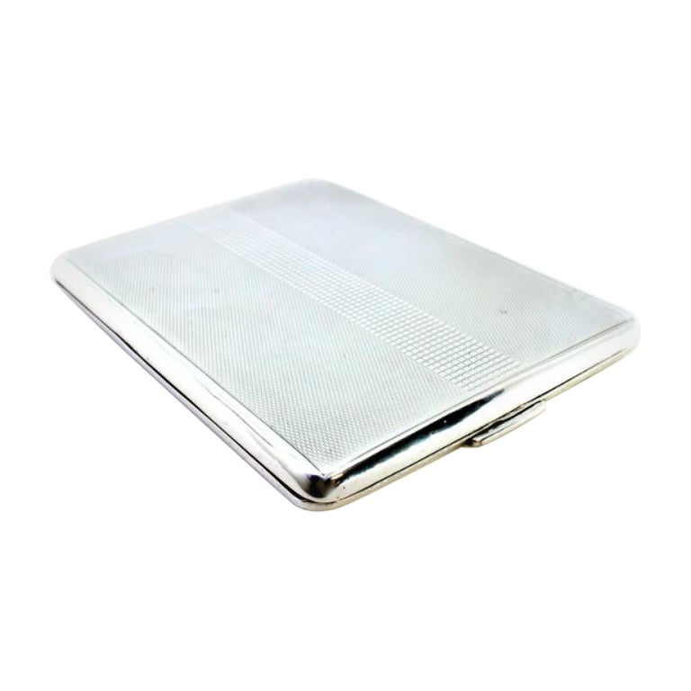 Guilloche silver cigarette case with bands along the length and spring lid