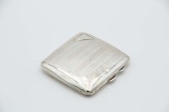 Guilloche silver cigarette case with bands at the top