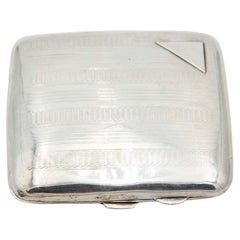 Guilloche silver cigarette case with bands at the top