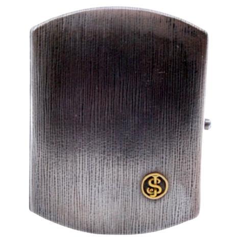 Guilloche silver cigarette case with blue cabochon 
gold interior For Sale