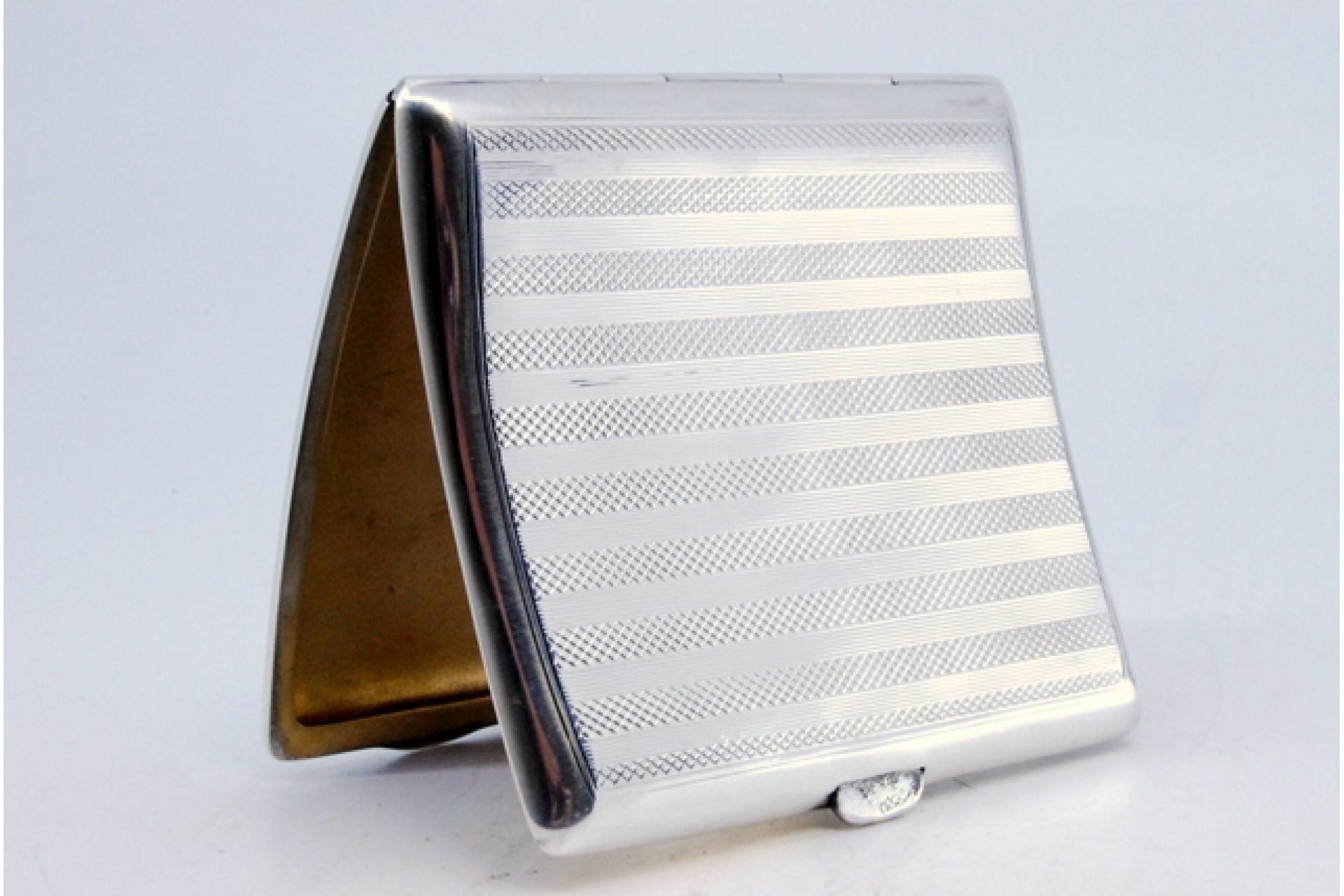 20th Century Guilloche silver cigarette case with curved bands at the top and hinged lid For Sale