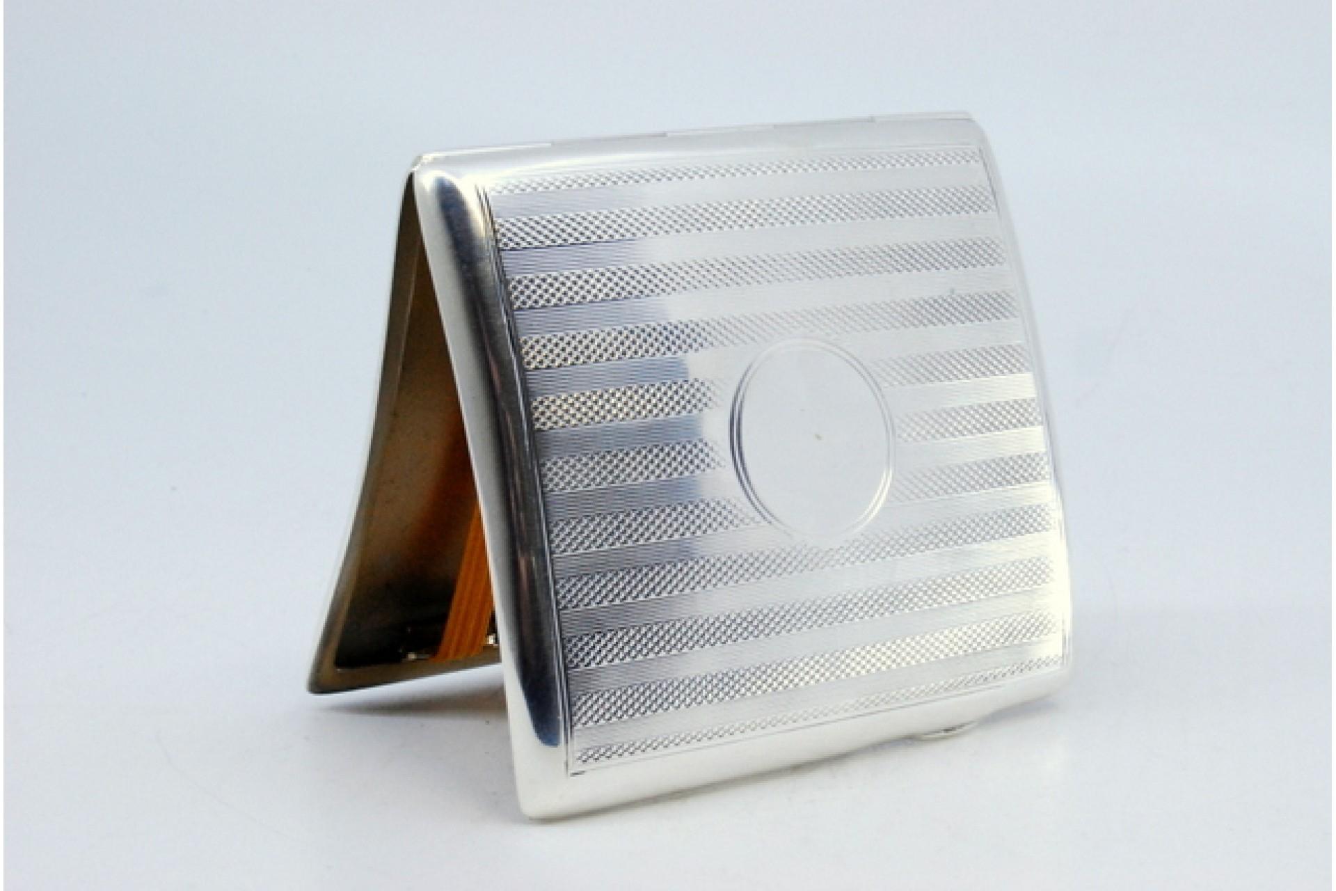 Silver Guilloche silver cigarette case with curved bands at the top and hinged lid For Sale
