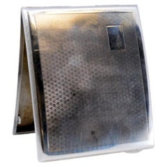 Guilloche silver cigarette case with curved monogram card 
polished edges