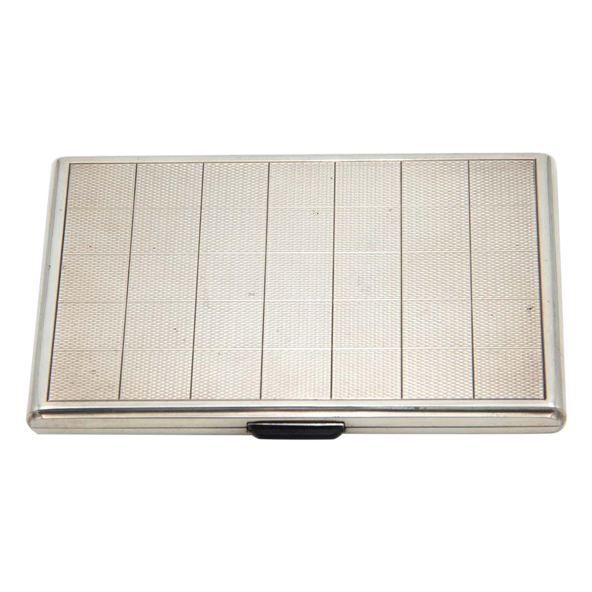 Guilloche silver cigarette case with gold interior