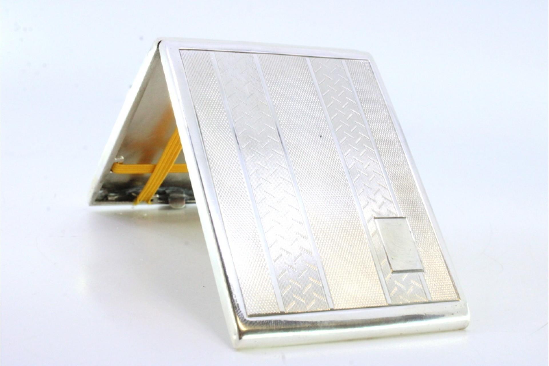20th Century Guilloche silver cigarette case with lengthwise bands around monogram plate For Sale