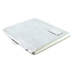 Guilloche silver cigarette case with monogram card and gold interior