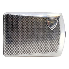 Guilloche silver cigarette case with monogram card, gold interior and hinged lid