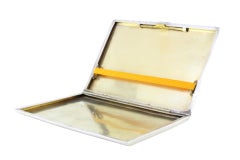 Guilloche silver cigarette case with opening application and gold interior