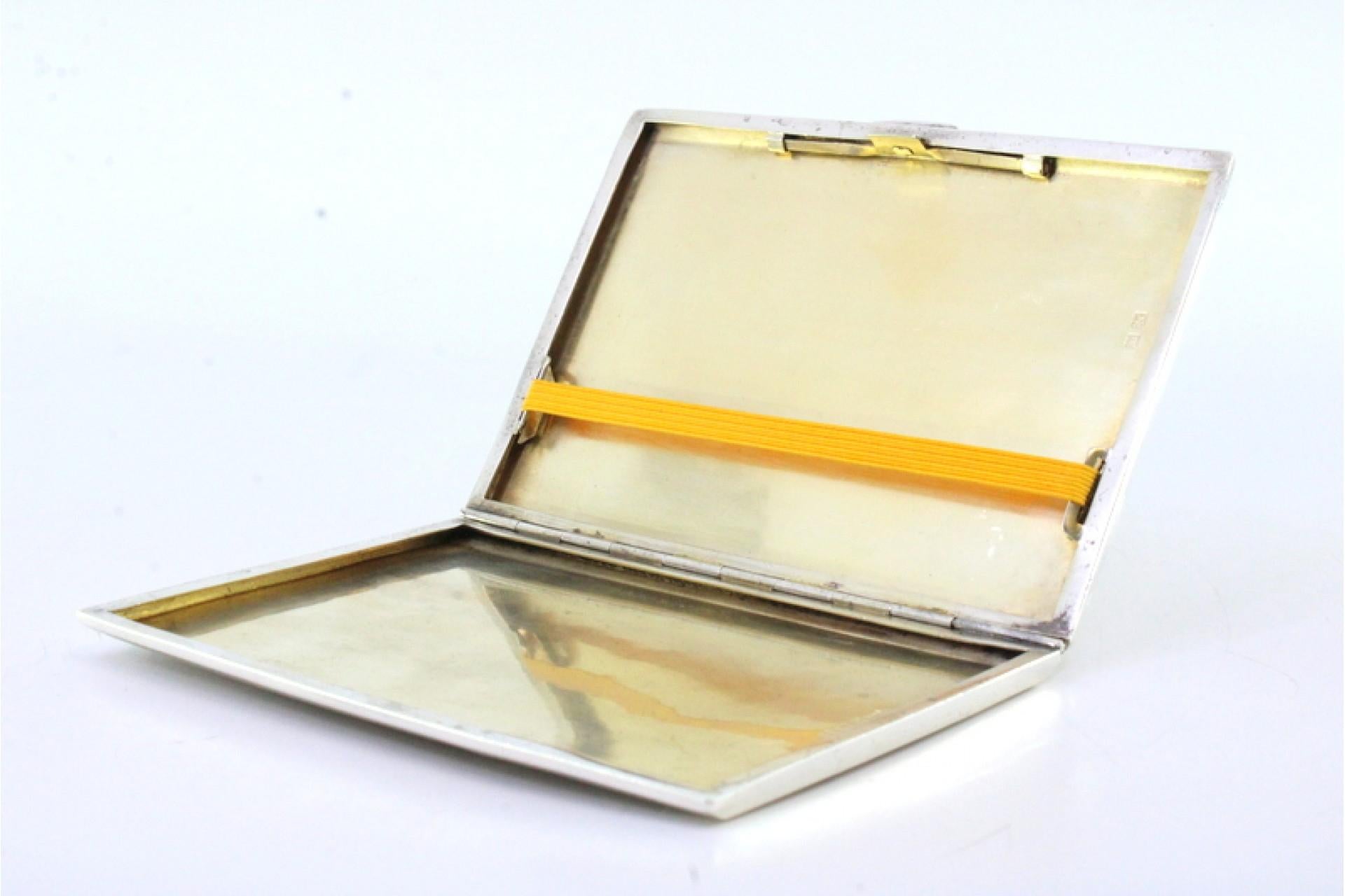 European Guilloche silver cigarette case with opening application and gold interior For Sale