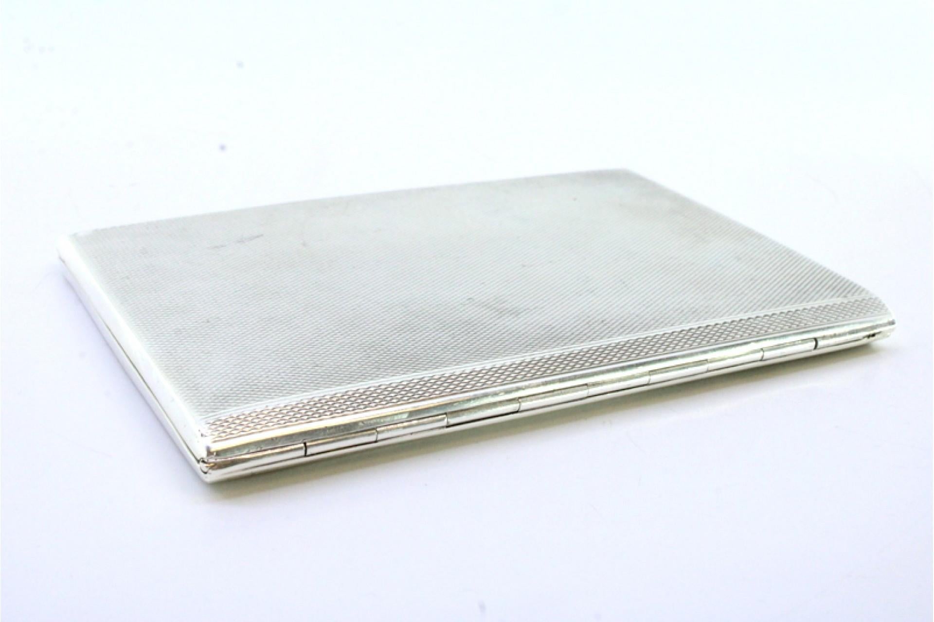 20th Century Guilloche silver cigarette case with opening application and gold interior For Sale