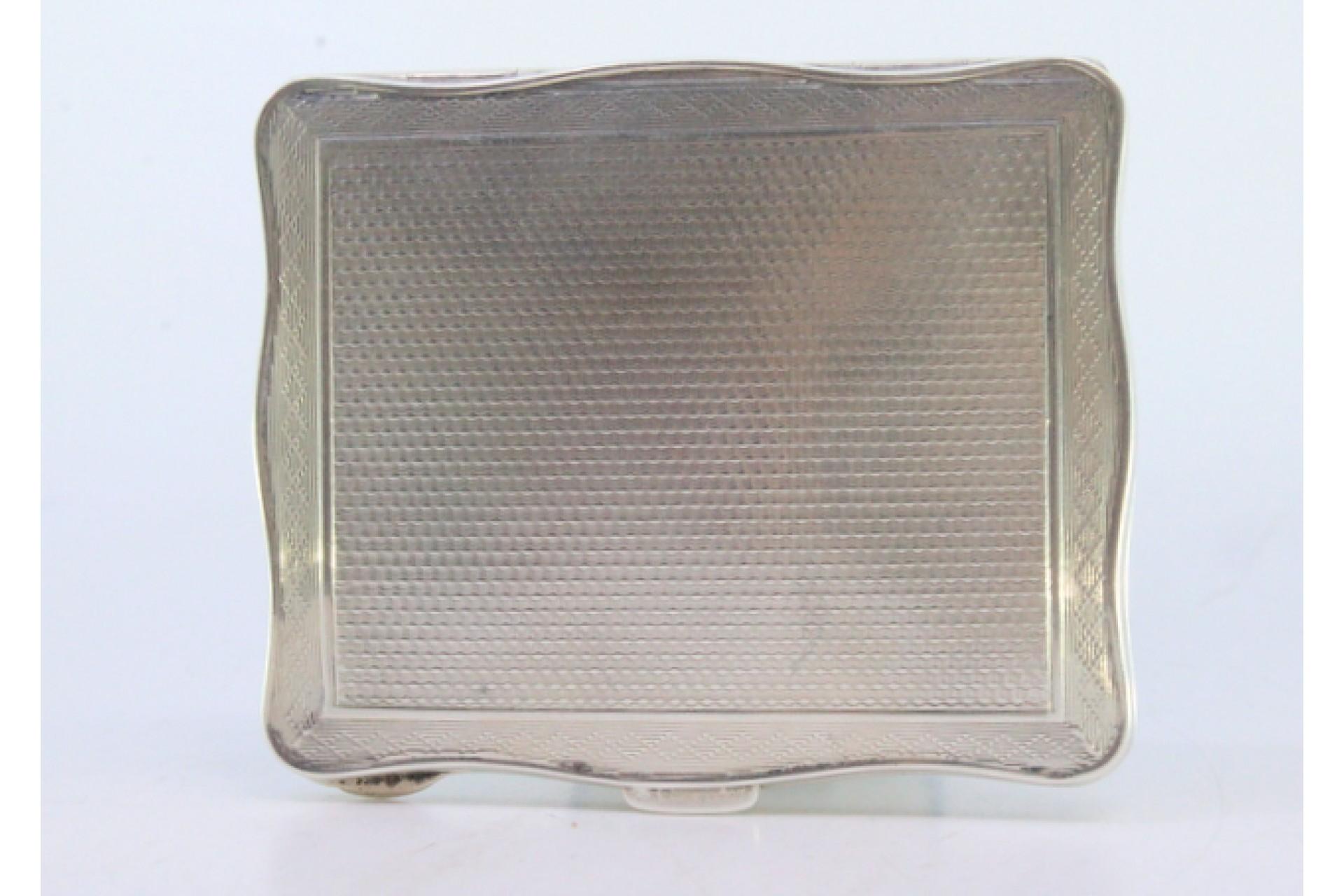 European Guilloche silver cigarette case with wavy edges and gold interior For Sale
