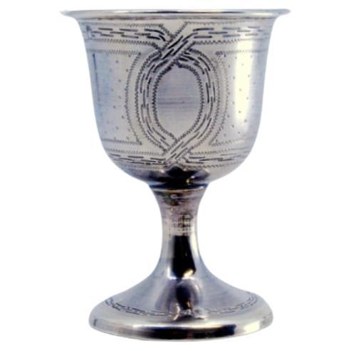 Guilloche silver egg cup set on a round base with friezes For Sale