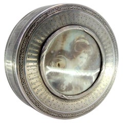 Guilloche silver jewelry box with friezes, gilt interior, and antique lady lid