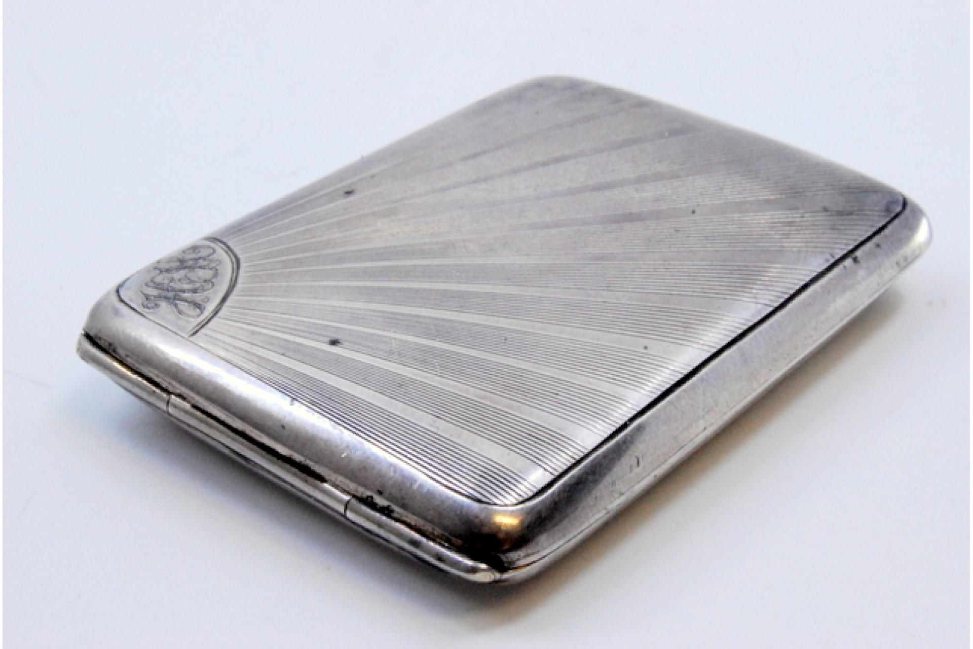 European Guilloche silver matchbook in the shape of a radiance and with a hinged lid For Sale