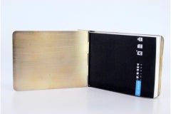 Guilloche silver notepad holder with bands along the length and notepad inside