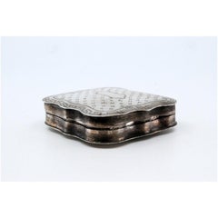 Guilloche silver pill box with monogram card on the hinged lid