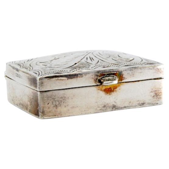 Guilloche silver pill box with plant motifs and hinged lid