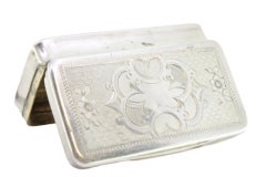 Guilloche silver snuff box with floral motifs and monogram