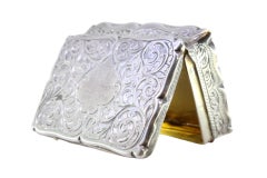 Guilloche silver snuff box with monogram and gold interior, George V period