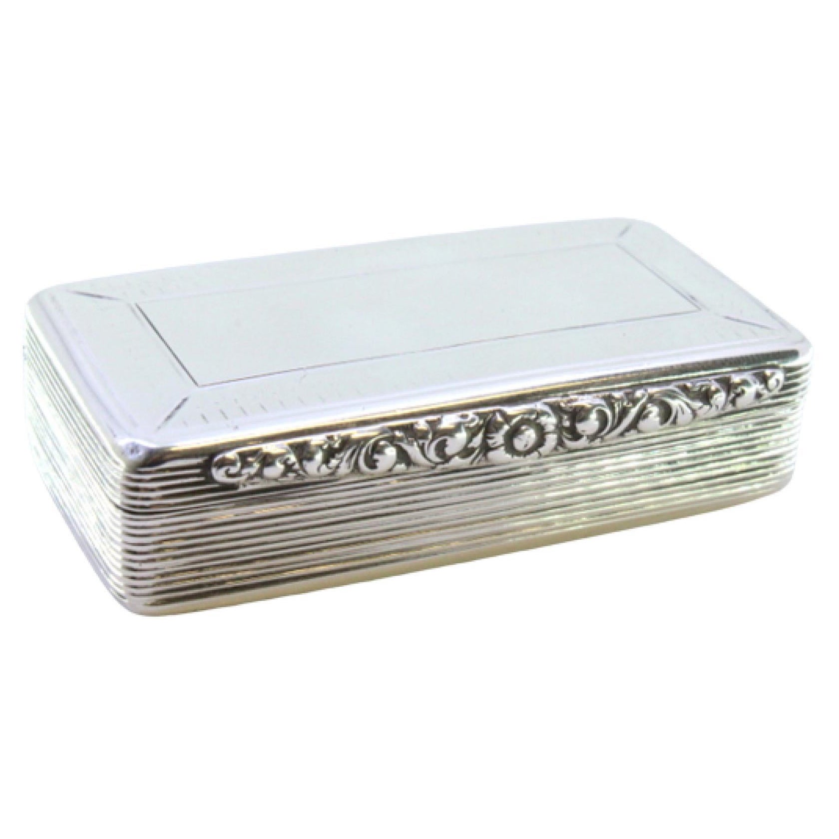 Guilloché silver snuff box with monogram cartouche and gold interior