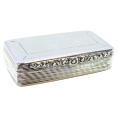 Guilloché silver snuff box with monogram cartouche and gold interior