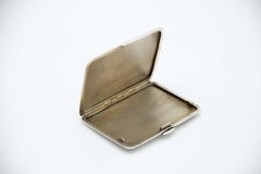 Guilloche silver snuffbox with bands at the top