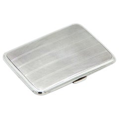 Guilloche silver snuffbox with bands at the top