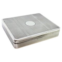 Guilloche silver snuffbox with friezes, monogram 
gold interior